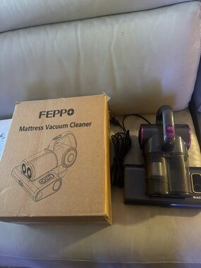 FEPPo Handheld Mattress Vacuum Cleaner in Purple and Black
